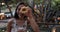 Mochi donuts, Pon de Ring Donuts, a Japanese snack. Woman showing and eating local food in Honolulu, Oahu, Hawaii