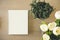 Mock up Book cover on table with Plant white Flower