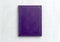 Mock up book violet color on gray background close-up