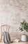 Mock up brick wall in Scandinavian interior background, beige room with natural wooden furniture
