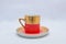 Mock up / design set of elegant and traditional colorful Red and gold traditional elegant coffee cup & Tea cup on cup`s plate besi