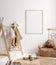 Mock up frame in children room with natural wooden furniture