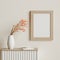 Mock up frame in cozy beige home interior background