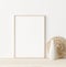 Mock up frame in home interior background, white room with natural wooden furniture, Scandi-Boho style