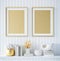 Mock up golden poster frame in interior background with decor