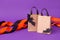 Mock up for Halloween sale massage on paper craft package for shopping on purple background, October autumn seasonal holiday sale