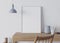 Mock up interior, wooden desk with empty frame, Scandinavian interior design