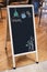 Mock up Menu Chalkboard sign stand with handwriting type Cafe Restaurant