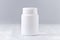 Mock up plastic bottle for medicine, powder, pills, tabs, capsules, selective focus