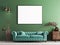 Mock up poster on green wall in interior classical style with light mint sofa, and decor.