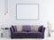 Mock up poster on a white wall in modern hipster interior with violet sofa and white table.