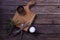 Mock up for restaraunt menu or recipe. Wooden cutting board with salt and pepper fork and knife on the gray rustic