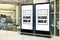 Mock up two blank vertical billboard passengers hall at airport