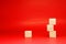 Mockup 4 wooden cube block object on red background and copy space - Word Editor Template