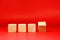 Mockup 4 wooden cube block object on red background and copy space - Word Editor Template