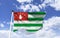 Mockup of Abkhazia Flag fluttering under blue sky