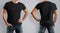 Mockup black t-shirt on strong man on gray background. Front vi