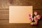 Mockup blank envelop on wood table for Valentine`s Day. Mock up for elegant design. Flat lay top view valentine`s day background