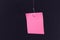 Mockup of a Blank Pink Memo Paper with Copy Space Hanging on a Fishing Hook