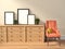 Mockup of blank three frame poster and chair. 3d illustration