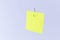 Mockup of a Blank Yellow Memo Paper with Copy Space Hanging on a Fishing Hook