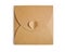 Mockup brown craft envelope with heart isolated clipping mask on white background with path, top view