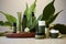 Mockup of cosmetic products with green leaves on wooden table. natures essence. organic facial skincare, makeup, and skin care