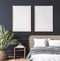 Mockup frame in dark bedroom interior, wooden rattan bed on empty dark wall background