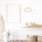 Mockup frame in minimal unisex child bedroom with natural wooden furniture