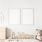 Mockup frame in minimal unisex child bedroom with natural wooden furniture