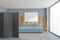 Mockup frame over blue sofa in wooden living room on grey tiled floor