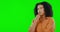 Mockup, green screen and woman with ideas, thinking and doubt against a studio background. Space, confused female and