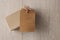 mockup kraft gift boxes with tag on wooden background