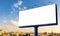 Mockup Large white blank billboard or white promotion poster displayed on the outdoor against the blue sky background. Promotion