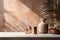 Mockup of modern empty brown concrete tabletop with cream jar, bathroom decor, palm tree branch in sunlight