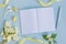 Mockup notebook with white jasmine flowers