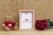Mockup Picture frame and cute bear with Bouquet of red roses on rusty wood. Valentines Day Background concept with copy space.
