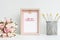Mockup Picture frame and pink roses. Valentines Day Background concept with copy space. Mock up with photo frame and flowers with