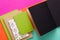 Mockup with set of various colorful notebooks