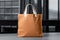 Mockup shopper tote bag handbag on table near office interior background. Copy space shopping eco reusable bag. Grocery