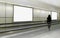 Mockup visual for advertising billboard display: person walking on moving walkway travelator in generic mrt train station. Blank