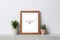 A mockup wooden frame with a white mat for an 8x10 inch photograph for modern or minimalist decor