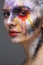 model with colorful artistic makeup