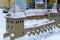model of a historic castle in miniature in the Park. open-air Museum. Winter, cold, building roofs covered with snow. The small
