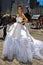 Model Kalyn Hemphill poses in front of horse carriage at the Irina Shabayeva SS 2016 Bridal photo shoot