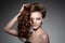 Model with long hair. Waves Curls Hairstyle. Hair Salon. Updo. F