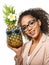 Model with pineapple in hands. African American Girl with Exotic Fruit. Cheerful woman with a smile relaxing on vacation. Image