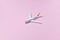 Model plane, airplane on pink color background. Travel concept with plane