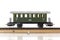 Model Train`s Vintage Passenger Car on the Rails