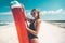 Model with watermelon lilo at the beach